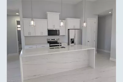 1032 NW 36th Pl, Cape Coral, FL 33993 - Photo 7