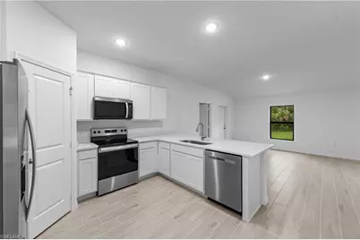 31 NW 25th Ter, Cape Coral, FL 33993 - Photo 7