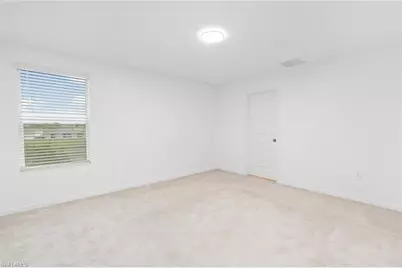 12230 Dakota Ridge Pl, Lehigh Acres, FL 33974 - Photo 13