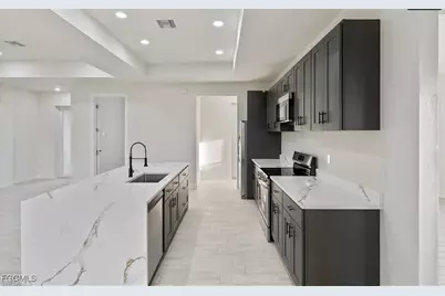 2719 42nd St W, Lehigh Acres, FL 33971 - Photo 3