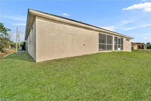 1402 Fred Ave S, Lehigh Acres, FL 33976 - Photo 3