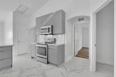 1402 Fred Ave S, Lehigh Acres, FL 33976 - Photo 25