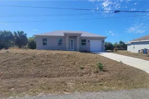 402 Harrison Dr, Lehigh Acres, FL 33936 - Photo 1