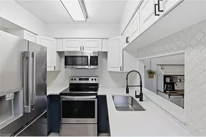 1103 SE 8th Ter #Unit D, Cape Coral, FL 33990 - Photo 5