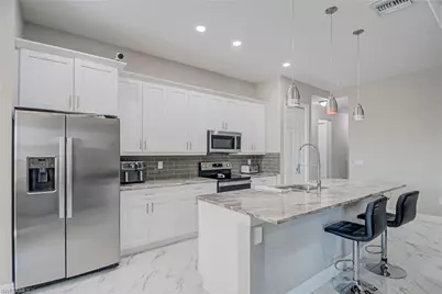 3309 30th St SW, Lehigh Acres, FL 33976 - Photo 7