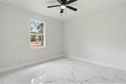 1042 Marshall Ave S, Lehigh Acres, FL 33974 - Photo 29