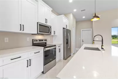 2809 25th St SW, Lehigh Acres, FL 33976 - Photo 11