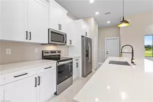 2809 25th St SW, Lehigh Acres, FL 33976 - Photo 11