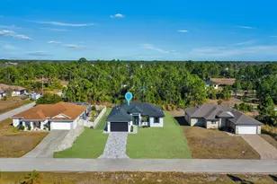 1033 Bassinger Ave S, Lehigh Acres, FL 33974 - Photo 3