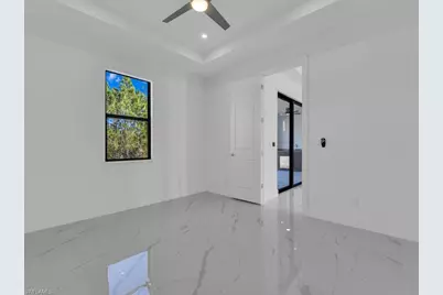 1033 Bassinger Ave S, Lehigh Acres, FL 33974 - Photo 17