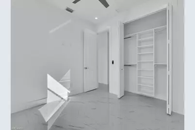 1033 Bassinger Ave S, Lehigh Acres, FL 33974 - Photo 21