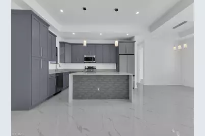 1033 Bassinger Ave S, Lehigh Acres, FL 33974 - Photo 7