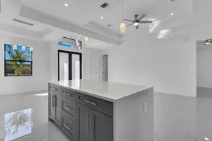 1033 Bassinger Ave S, Lehigh Acres, FL 33974 - Photo 9