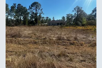 1044 Bells St E, Lehigh Acres, FL 33974 - Photo 1