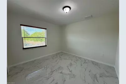 884 Alabama Rd S, Lehigh Acres, FL 33974 - Photo 21