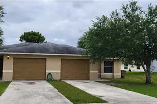 711 Jack Ave S, Lehigh Acres, FL 33973 - Photo 1