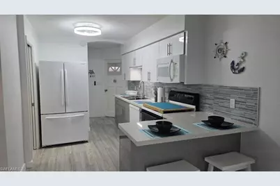 3211 Stringfellow Rd #105, Saint James City, FL 33956 - Photo 11