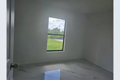 2707 30th St SW, Lehigh Acres, FL 33976 - Photo 13