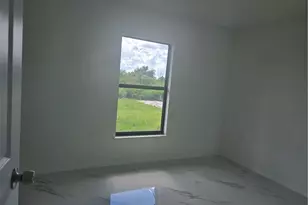 2707 30th St SW, Lehigh Acres, FL 33976 - Photo 13