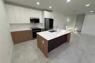 1409 NW 21st Ct, Cape Coral, FL 33909 - Photo 7