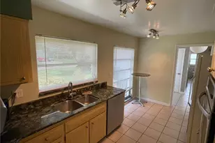 1040 SE 43rd St, Cape Coral, FL 33904 - Photo 3