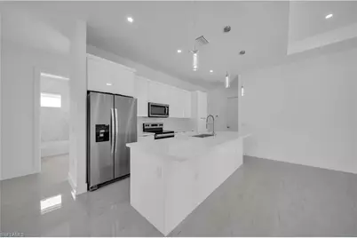 4703 Sara Ave N, Lehigh Acres, FL 33971 - Photo 9