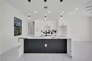 706 Theodore Vail St E, Lehigh Acres, FL 33974 - Photo 9