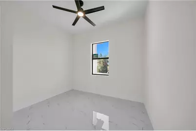 706 Theodore Vail St E, Lehigh Acres, FL 33974 - Photo 21