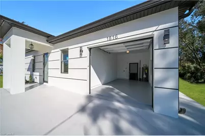 706 Theodore Vail St E, Lehigh Acres, FL 33974 - Photo 5