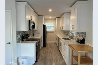 7072 Sundiet Blvd, Bokeelia, FL 33922 - Photo 7