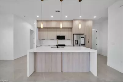 609 NE 11th Ter, Cape Coral, FL 33909 - Photo 19