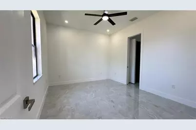 358 Charwood Ave S, Lehigh Acres, FL 33974 - Photo 27