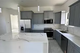 358 Charwood Ave S, Lehigh Acres, FL 33974 - Photo 15