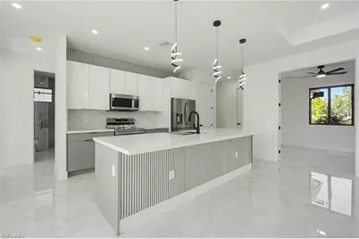 369 Woodburn Dr, Lehigh Acres, FL 33972 - Photo 9