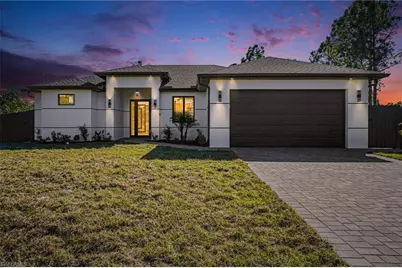 369 Woodburn Dr, Lehigh Acres, FL 33972 - Photo 1