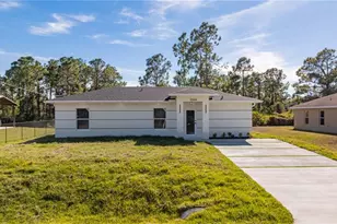 1120 Ravenswood St E, Lehigh Acres, FL 33974 - Photo 1