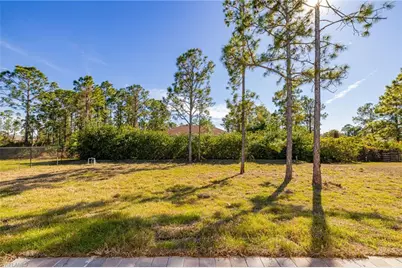 1120 Ravenswood St E, Lehigh Acres, FL 33974 - Photo 25