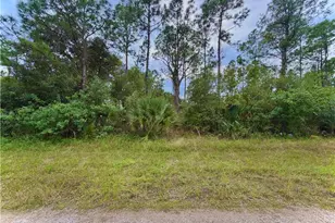 1242 Random St E, Lehigh Acres, FL 33974 - Photo 1