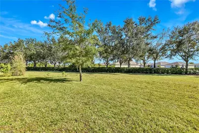 10357 Silver Pond Ln, Lehigh Acres, FL 33936 - Photo 17