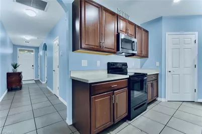 10357 Silver Pond Ln, Lehigh Acres, FL 33936 - Photo 9