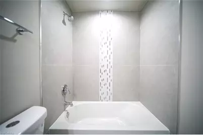 430 Burrstone Dr, Lehigh Acres, FL 33974 - Photo 9