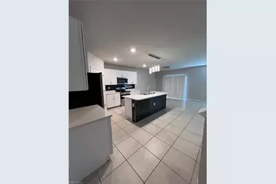 10601 Crossback Ln, Lehigh Acres, FL 33936 - Photo 7