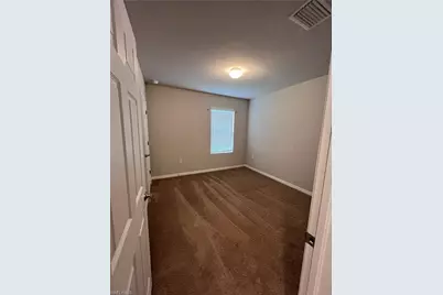 10601 Crossback Ln, Lehigh Acres, FL 33936 - Photo 15