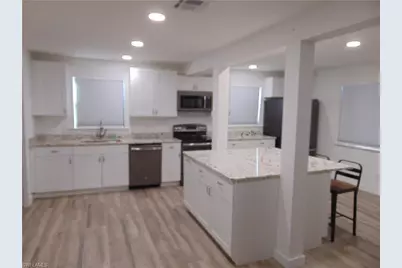 1303 SW 16th Ter #103, Cape Coral, FL 33991 - Photo 3