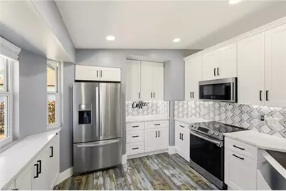 3404 2nd St SW, Lehigh Acres, FL 33976 - Photo 13