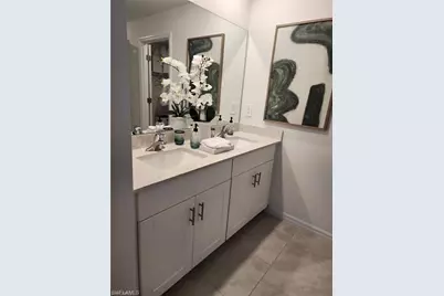 20380 Caroline Creek Pl, Lehigh Acres, FL 33974 - Photo 19