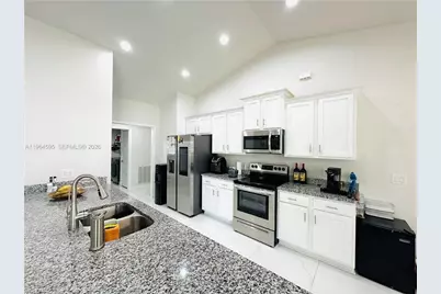 1137 NE 4th Pl, Cape Coral, FL 33909 - Photo 7