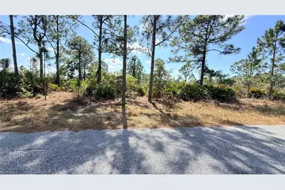 1076 Bells St E, Lehigh Acres, FL 33974 - Photo 3