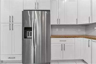 702 Norman Ave N, Lehigh Acres, FL 33971 - Photo 9