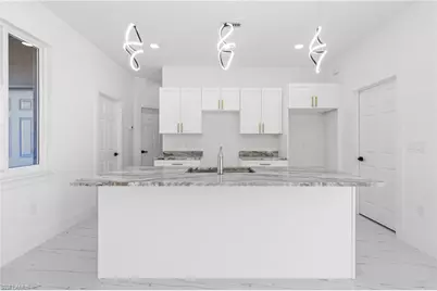 2716 25th St SW, Lehigh Acres, FL 33976 - Photo 37